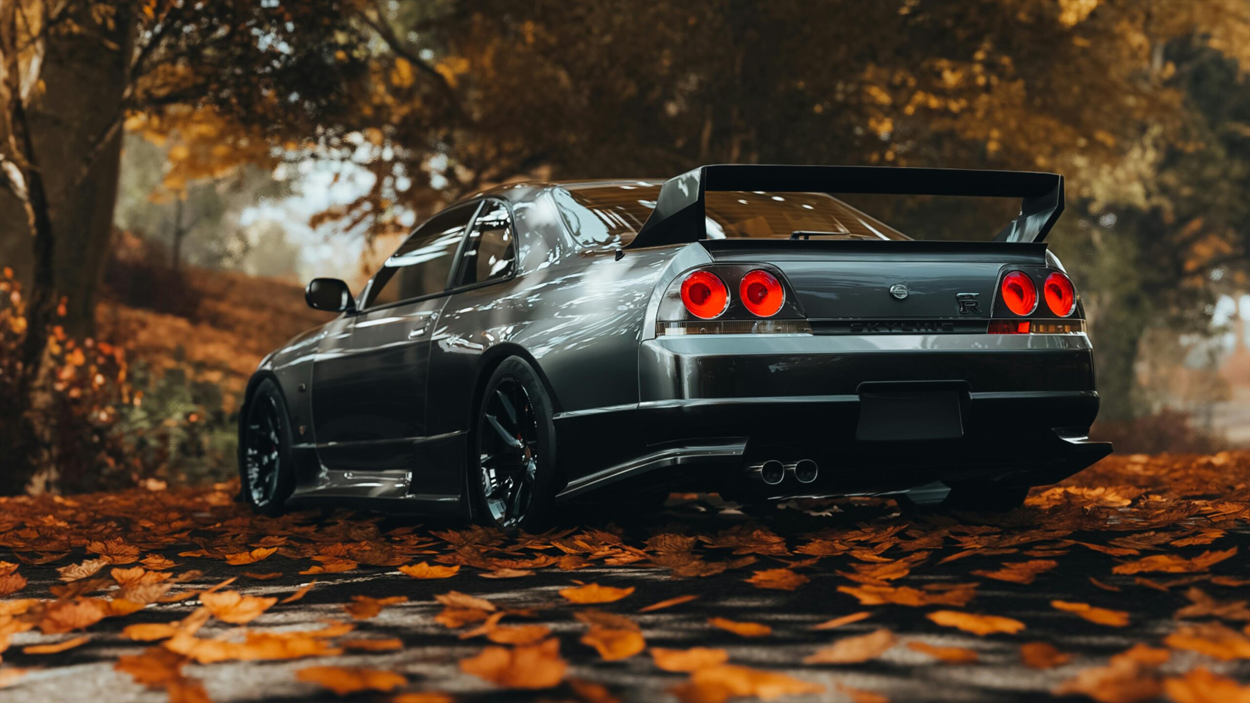 A sleek Nissan Skyline GTR R33 captured amidst vibrant autumn leaves, showcasing its sporty design.