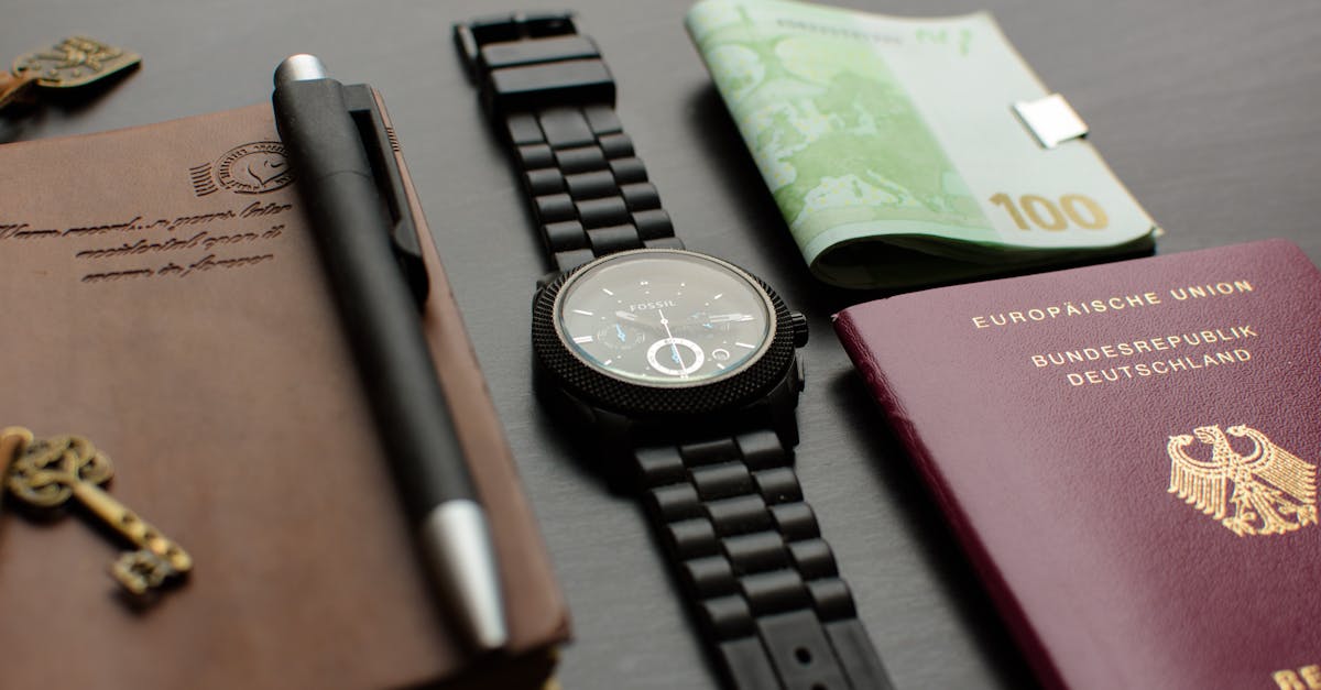 A neatly arranged flat lay depicting essential travel items such as a German passport, wristwatch, and euro bills on a desk. Inspector arrested passport fraud