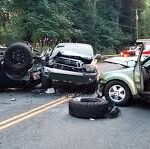 One killed, six injured in car-auto collision