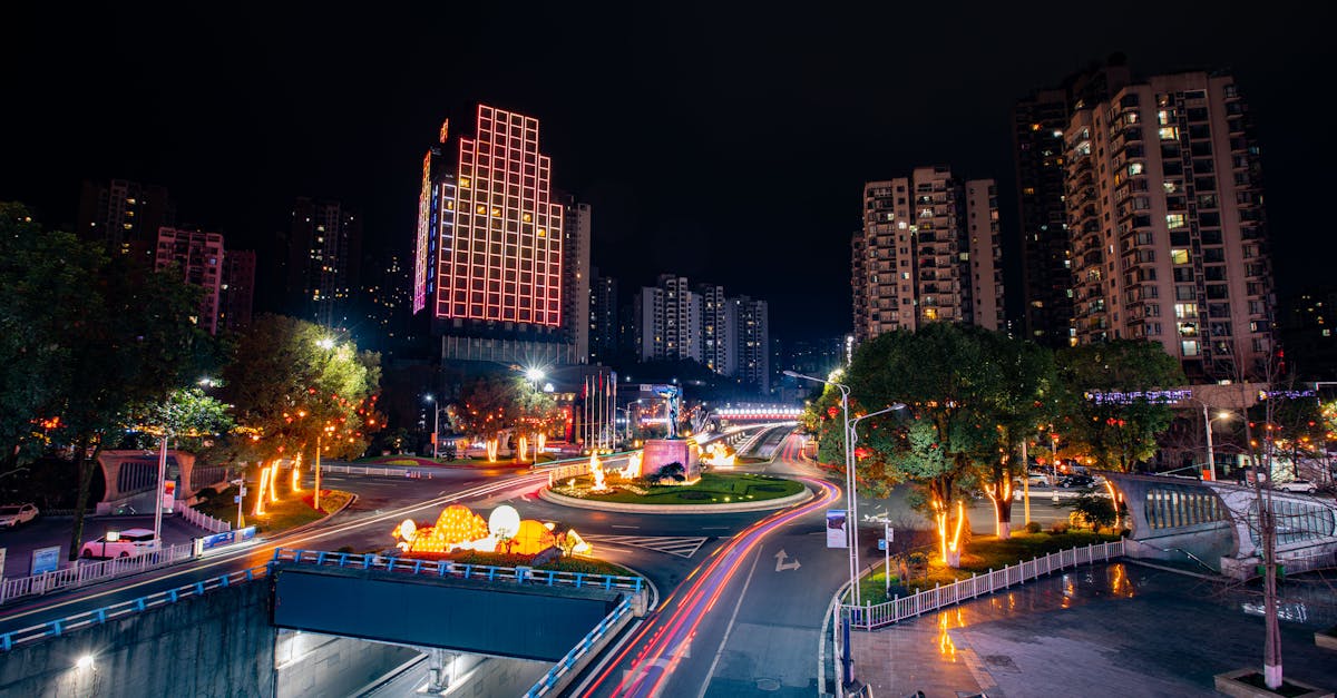 Cityscape at night with vibrant light trails and illuminated buildings. City Smart LED Lighting Project, new delhi City Smart LED Lighting Project